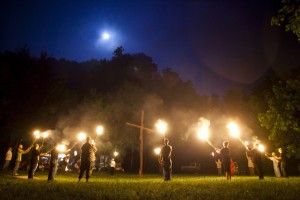 Members of Virgil's White Knights of the Ku Klux Klan begin a late-night cross lighting ceremony on private property in Dungannon, Virginia, USA, 11 June 2011. (EPA/JIM LO SCALZO)