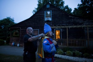 Daniel Zimmerman (L), a member of the Knights of the Southern Cross of the Ku Klux Klan, adjusts the robe of Imperial Giant Paul LaMonica (R) shortly before a cross lighting ceremony on private property near Powhatan, Virginia, USA, 25 May 2011. (EPA/JIM LO SCALZO)